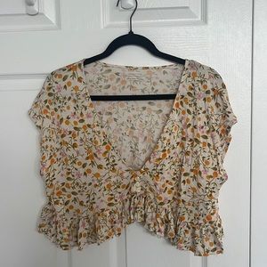 Orange and flower crop top